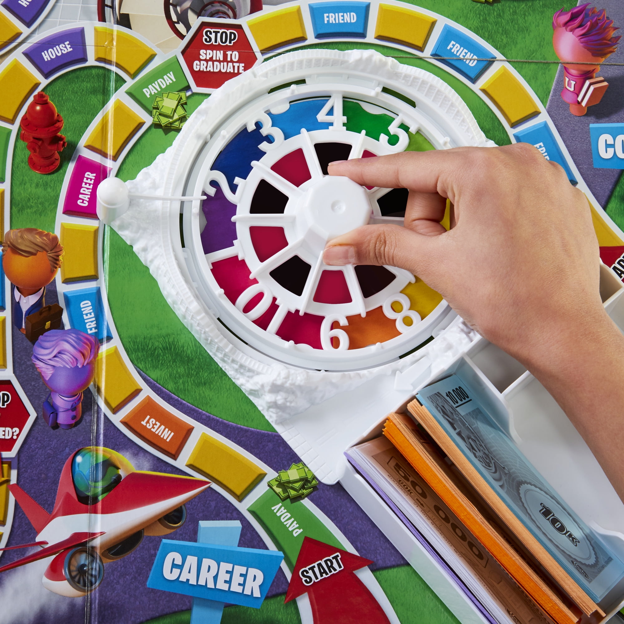 The Game of Life Game, Family Board Game, For Ages 8+, Pegs Come In 6  Colors 