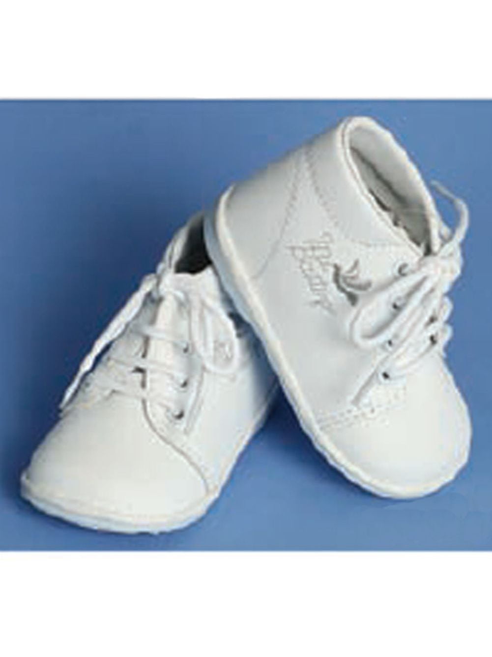 white embroidered shoes