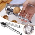 thumbnail image 2 of CAROOTU Garlic Press Nut Cracker Multifunctional Stainless Steel Walnut Garlic Crusher Kitchen Tool Dishwasher Safe, 2 of 5
