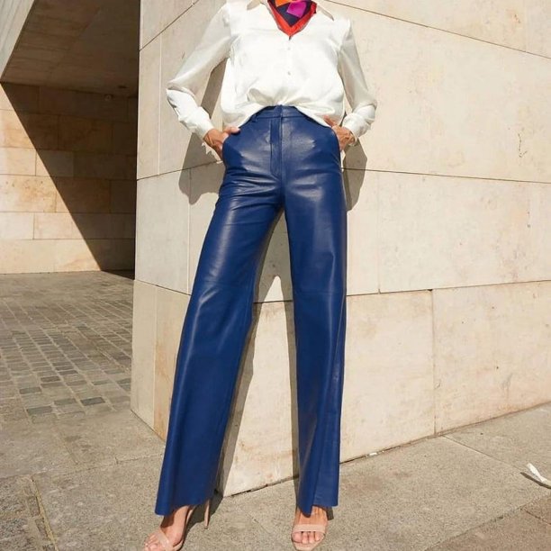 Pantalones casuales de mujer de estilo europeo y americano de moda de primavera de cuero PU de cintura media alta y cadera recta para mujer
