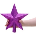 thumbnail image 3 of Decoración con forma de estrella en la copa de un árbol con, 3 of 7