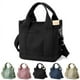 thumbnail image 1 of Bolso de mano para mujer, de lona, de gran capacidad, con múltiples bolsillos y cremallera, bandolera, estilo nicho, color negro., 1 of 7
