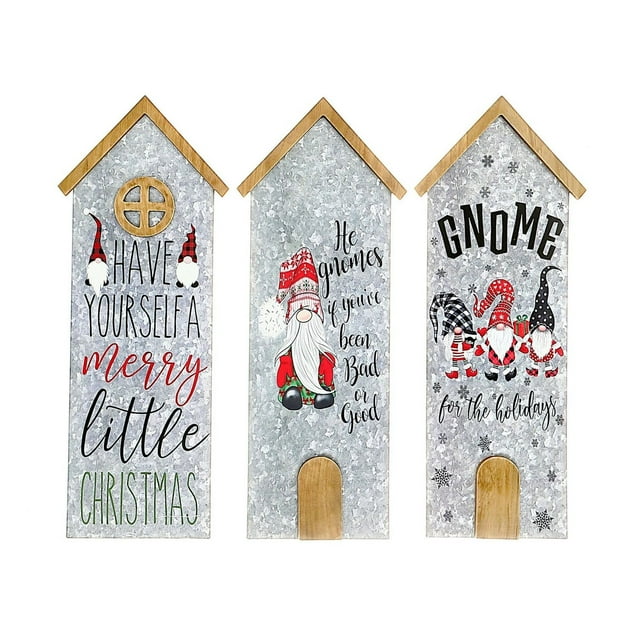 House Shaped Galvanized Gnome Greetings (Asstd) - Set of 3 metal Christmas wall décor with wooden roofs and doors, featuring colorful gnome illustrations and festive holiday greetings in red, black, and green on galvanized metal, ideal for hanging on doors or walls.