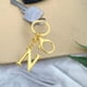 thumbnail image 1 of 1 llavero de metal con letras doradas de la A a la Z, ideal como regalo de Navidad, para decorar el hogar otoñal o para decorar la habitación., 1 of 6