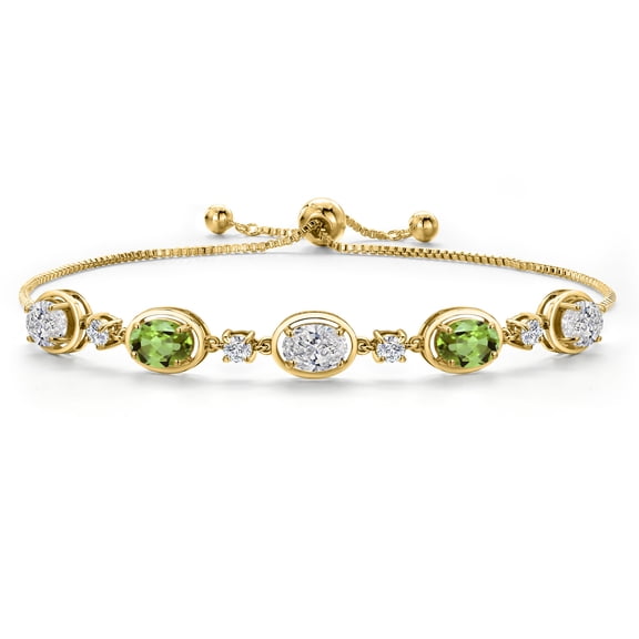 Gem Stone King 18K Yellow Gold Plated Silver White Lab Grown Diamond and Green Peridot Bracelet for Women | 3.90 Cttw | Gemstone April Birthstone | Oval 7X5MM | Fully Adjustable 9 inch