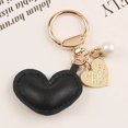 thumbnail image 1 of Llaveros de corazón de diamantes de imitación para mujer, llavero colgante de bolso, llavero de cristal de Color sólido, llavero de corazón de melocotón para pareja, 1 of 4