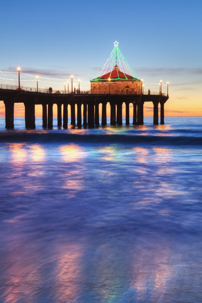 Manhattan Beach Pier at sunset completed in 1920 Roundhouse Marine Studies Lab and Aquarium (octagonal building end of pier) Manhattan Beach California United States of America Canvas Art - Richard Ma