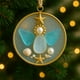 thumbnail image 2 of Adorno navideño de nacimiento de vidrio marino inspirado en el adorno de la Natividad de vidrio marino hecho a mano., 2 of 6