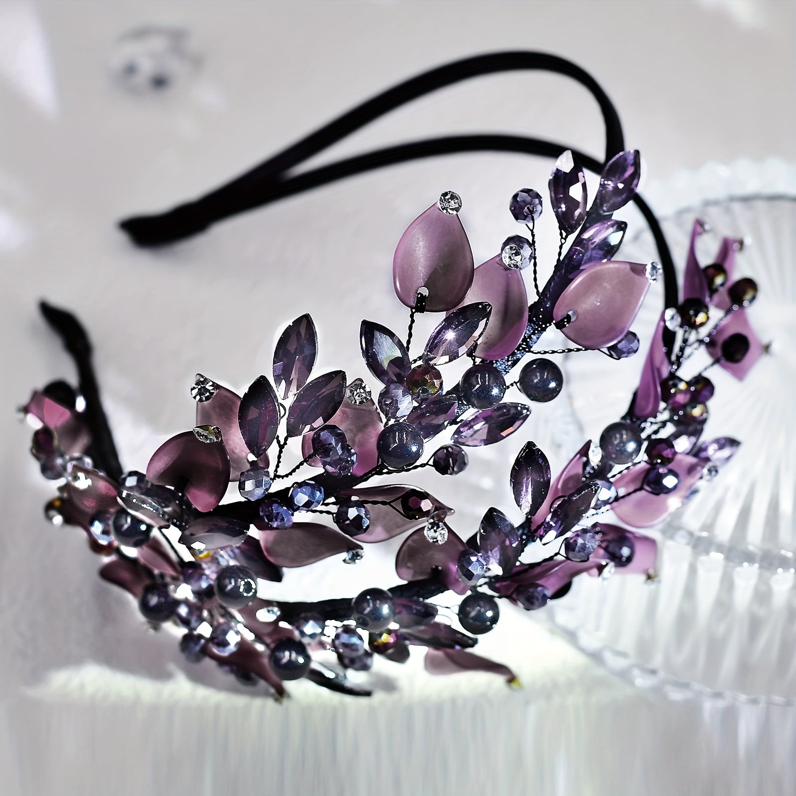A stylish double-layered headband, designed for women, features purple polymer clay leaf patterns and rhinestones, making it the perfect accessory for photoshohoots and everyday wear.