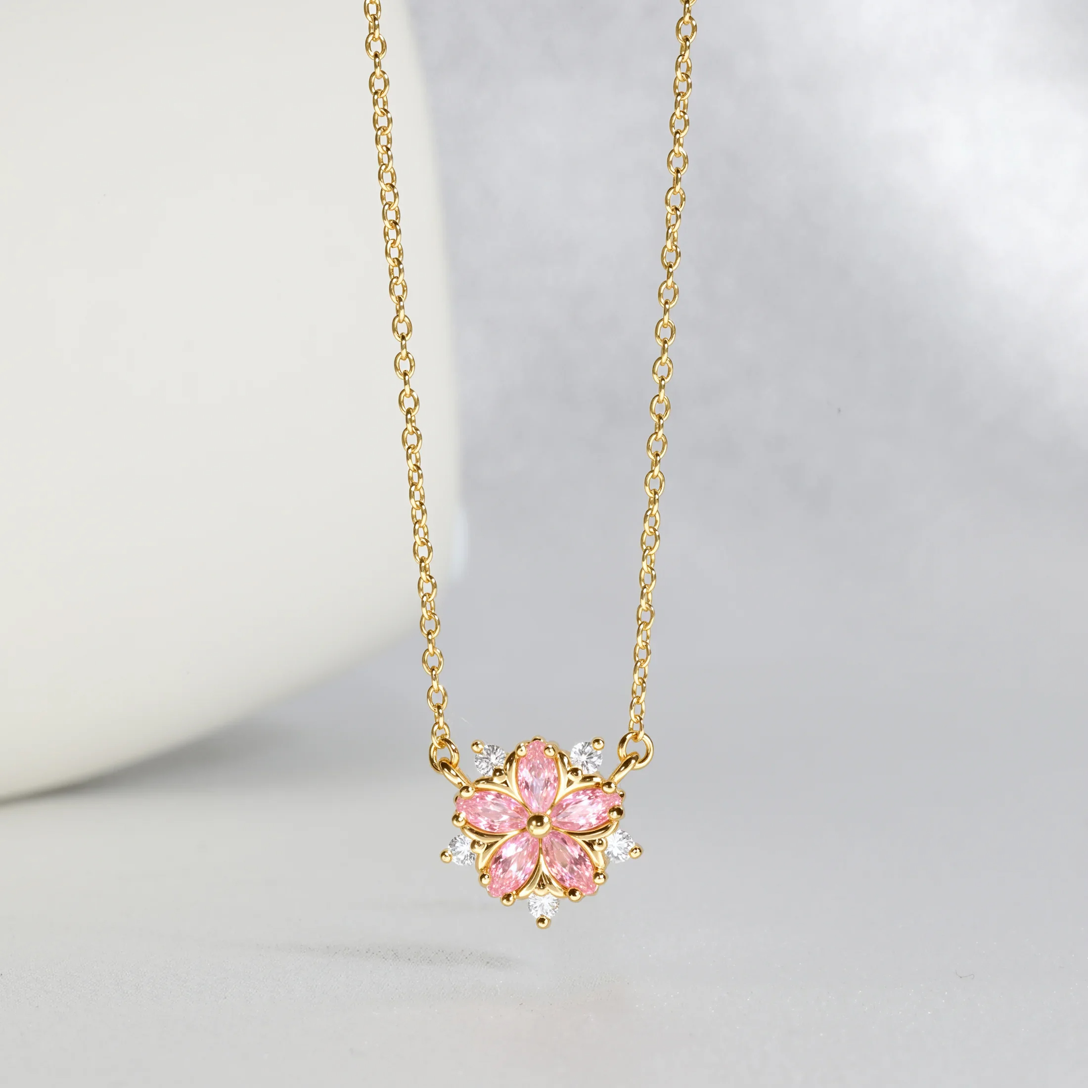 MENGLISI Light Pink Cubic Zirconia Five-Petal Flower Pendant Necklace for Women, 14K Gold Plated Copper