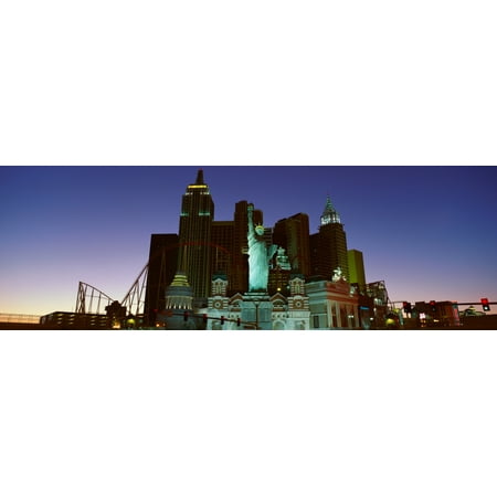 Statue Of Liberty Image - Panoramic view of New York New York Hotel with Statue of Liberty at sunrise Las Vegas NV Stretched Canvas - Panoramic Images (36 x 12)