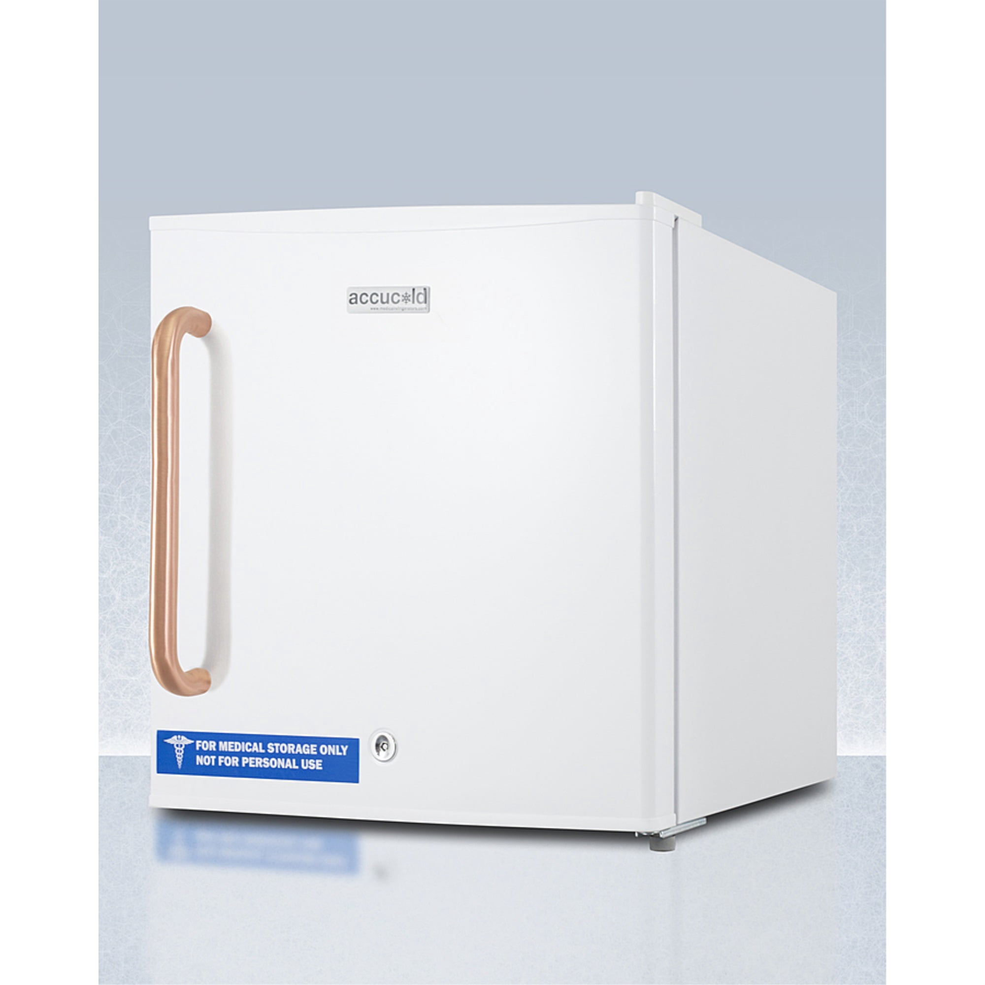 Compact manual defrost all-freezer with lock and copper handle