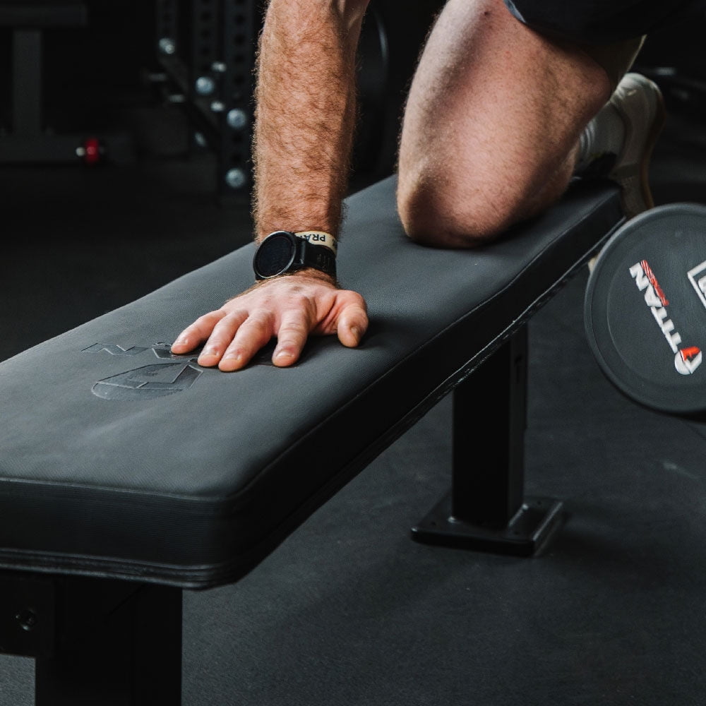 Titan Fitness Elite Series Single Post Flat Bench, 2.5" Thick HeftyGrip Vinyl Pad, Rated 1,000 LB, Dedicated Home Gym Competition Weightlifting & Strength Training Utility Bench