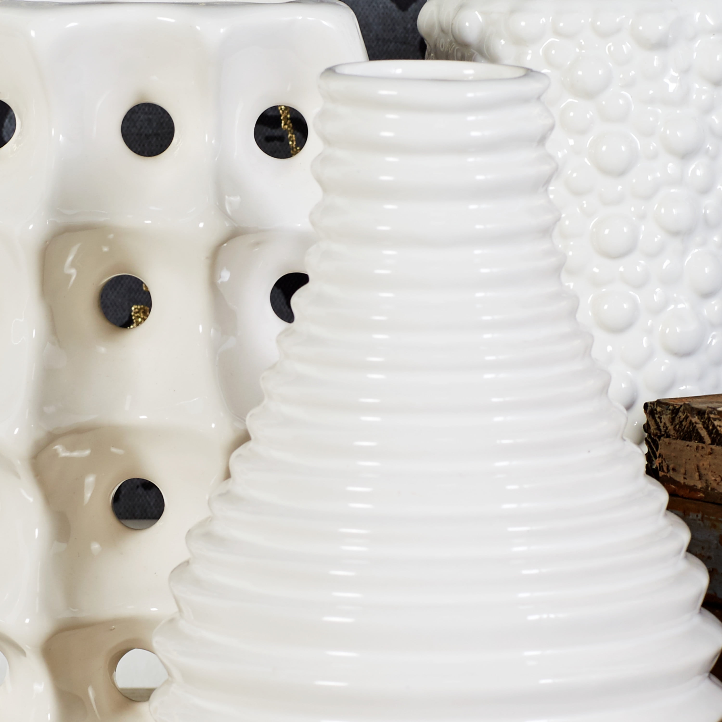 CosmoLiving by Cosmopolitan 5"W, 8"H White Ceramic Vase with Varying Patterns, Set of 3