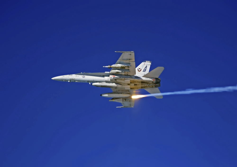An FA-18C Hornet testing its flare countermeasures system prior to heading into Iraq Canvas Art - Stocktrek Images (33 x 24)