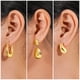 thumbnail image 2 of JeenMata Juego de 3 Pares de Pendientes de Moda para Mujer en Baño de Oro Amarillo, Pendientes de Aro, Pendientes Hipoalergénicos Colgantes Gruesos y Livianos, Regalo de Joyería para Mujer, 2 of 5