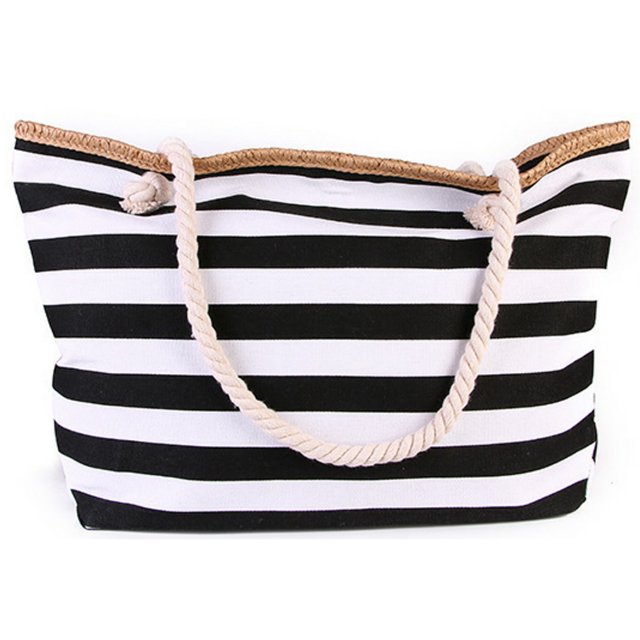 Coofit Beach Tote Bag Fashion Striped Multi-purpose Canvas Shoulder Bag Tote Handbag with a black and white striped design, crafted from durable canvas material. Features include a rope-style handle, a spacious main pocket, and an inside slot pocket. Suitable for beach, pool, travel, and daily use, it measures 54 x 13.5 x 33 cm (21.26 x 5.31 x 12.99 in). Often categorized as a messenger bag for versatile carrying options.
