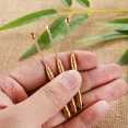 thumbnail image 2 of Pinzas de latón amarillas para quitar la cera de los oídos, herramienta de llavero, cuchara para los oídos desmontable, cuidado perfecto, 2 of 4