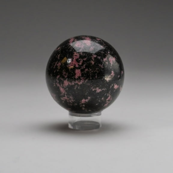 Polished Imperial Rhodonite Sphere from Madagascar (1.2 lbs)