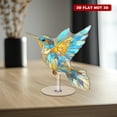 thumbnail image 4 of Rotating acrylic ornament featuring a stunning stained glass hummingbird with vibrant colors and elegant gold foil details on a white background, 4 of 8