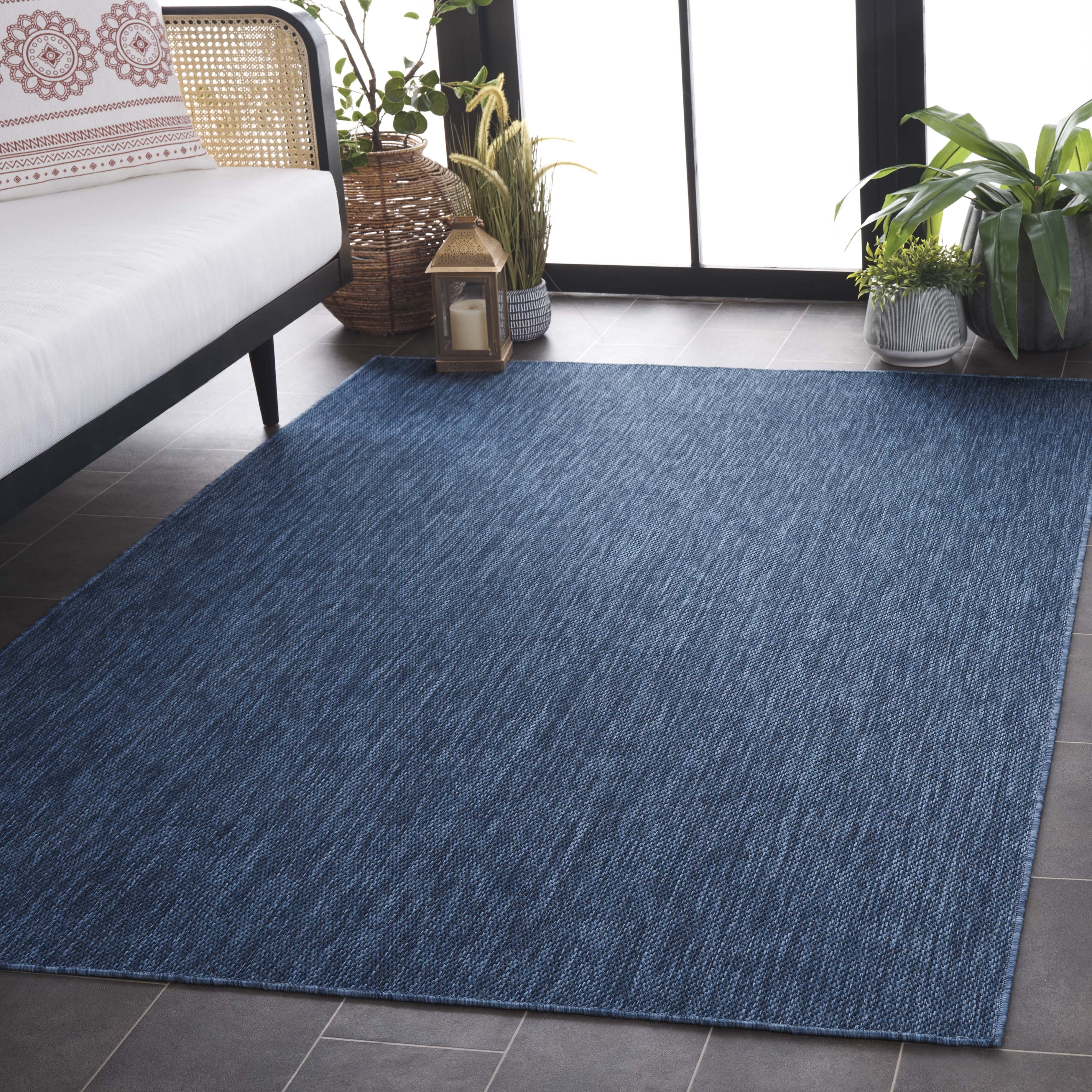 SAFAVIEH Beach House Lauressa Solid Indoor/Outdoor Area Rug, Blue, 5'3" x 7'6"