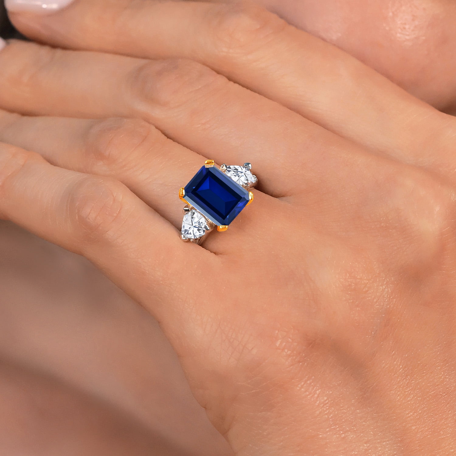 Gem Stone King 5.13 Cttw Blue Created Sapphire and White Moissanite 3-Stone Engagement Ring for Women | 925 Sterling Silver and 10K Yellow Gold | Emerald Cut 10X8MM | Size 6
