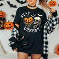 thumbnail image 3 of Stay Creepy Halloween T-Shirt, Pumpkin Skull Graphic Tee, Retro Spooky Season Shirt, Vintage Comfort Colors Halloween Apparel Gift for Her - Black, S, 3 of 5