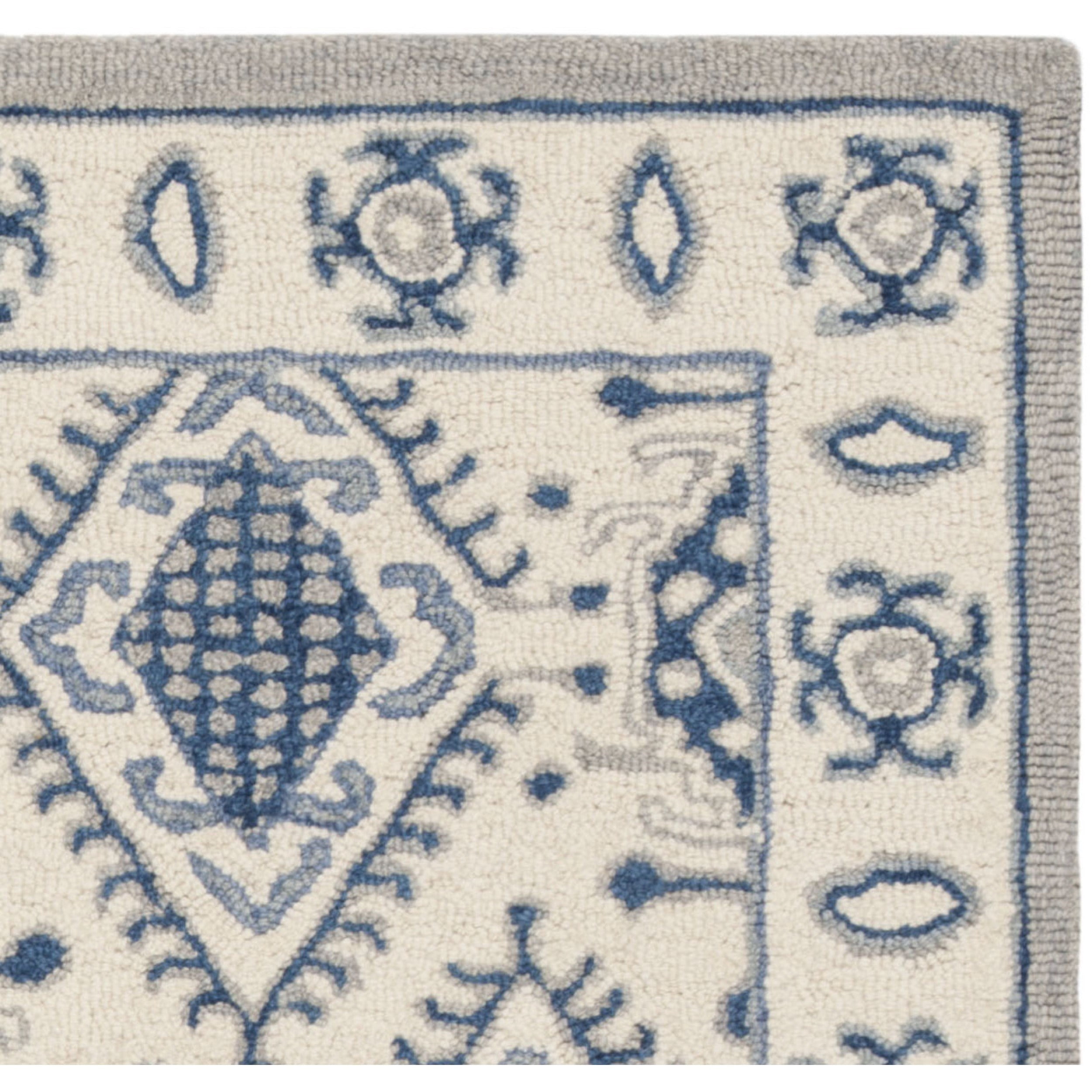 SAFAVIEH Micro-Loop Jolene Geometric Wool Area Rug, Ivory/Blue, 5' x 8'