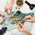 thumbnail image 4 of Feathers Cutting Board, Vaned Types and Natal Contour Flight Bird Feathers and Animal Skin Element Print, Tempered Glass Cutting and Serving Board, Wine Bottle Shape, Teal Brown, by Ambesonne, 4 of 5