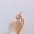 thumbnail image 3 of Anillo giratorio con forma de huella de pata para aliviar el estrés y la ansiedad, gira libremente, banda de acero inoxidable para el autismo, joyería de compromiso, boda y nacimiento., 3 of 4