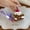1 cherry brown cake with a purple heart and a purple hanging strap accessory, variant on New Korean plush cake, hamburger, and hot dog lanyard accessories, cute and unique design keychain bag pendant