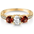 thumbnail image 3 of Gem Stone King 2.22 Ct Oval White Created Sapphire Red Garnet 18K Yellow Gold Plated Silver Ring (Size 7), 3 of 6