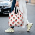 thumbnail image 5 of Xecao's Hand Drawn Strawberry Canvas Tote Bag is a versatile choice for women, serving as a stylish beach bag, shopping bag,and reusable grocery bag., 5 of 5