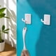 thumbnail image 1 of Fiudx Ganchos Magnéticos, Diseño Adhesivo Fuerte, Instalación Sin Taladros, Material Plástico Resistente, Organizador de Cocina y Baño, Solución para Ahorrar Espacio, Juego de Dos, 1 of 6