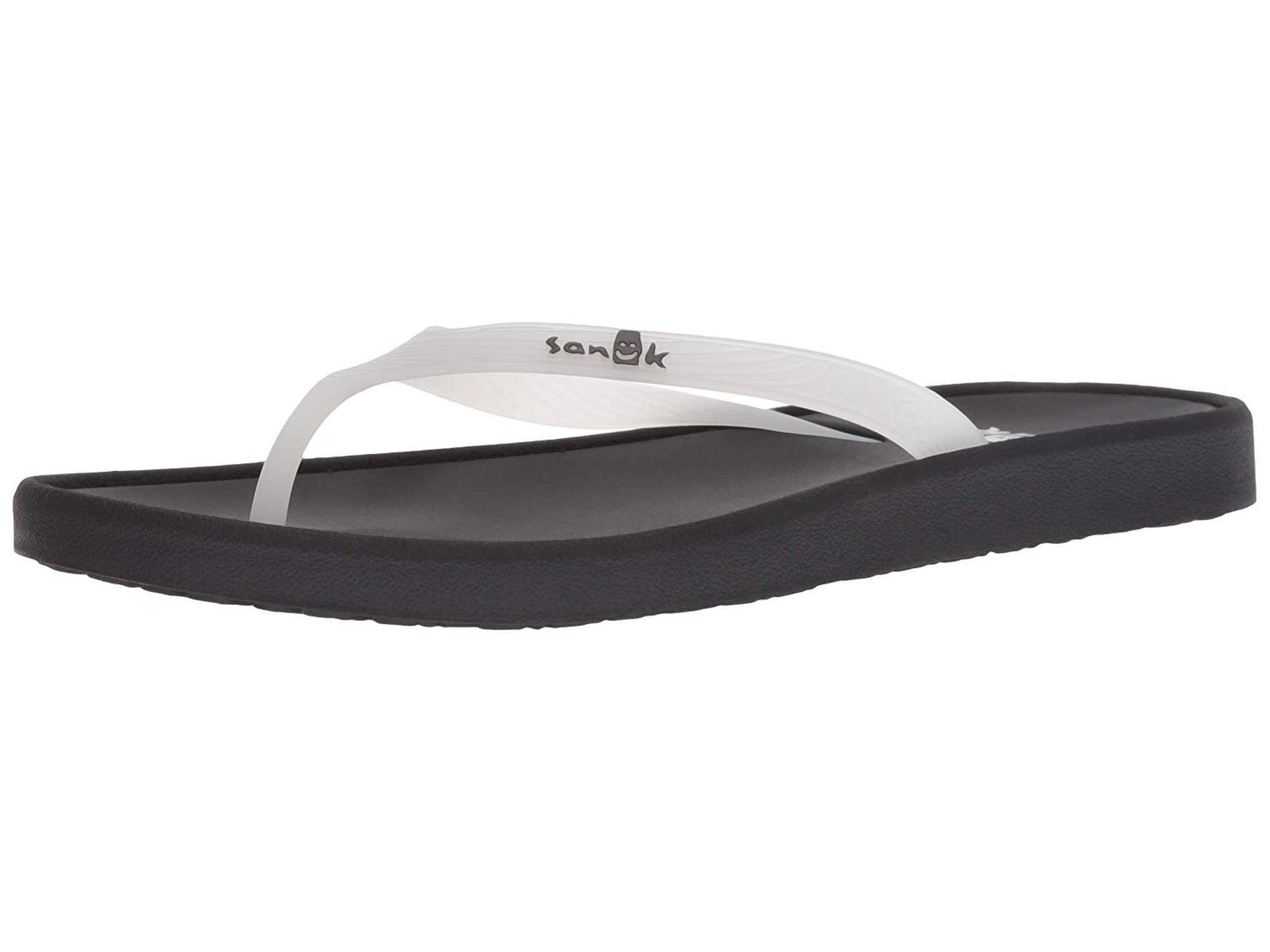 white sanuk flip flops