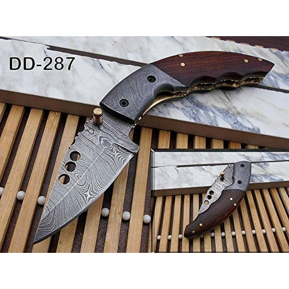 7" long Damascus steel Folding Knife with 3 holes, Rose wood scale with Damascus bolster, custom made 3" Hand Forged twist pattern blade, cow hide leather sheath included