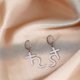 thumbnail image 1 of Pendientes de aro de acero inoxidable Shaofei con símbolo del sol para mujer, 1 of 5
