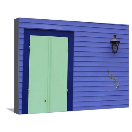 Glaring Turquoise Door on a Bright Purple House Stretched Canvas Print Wall