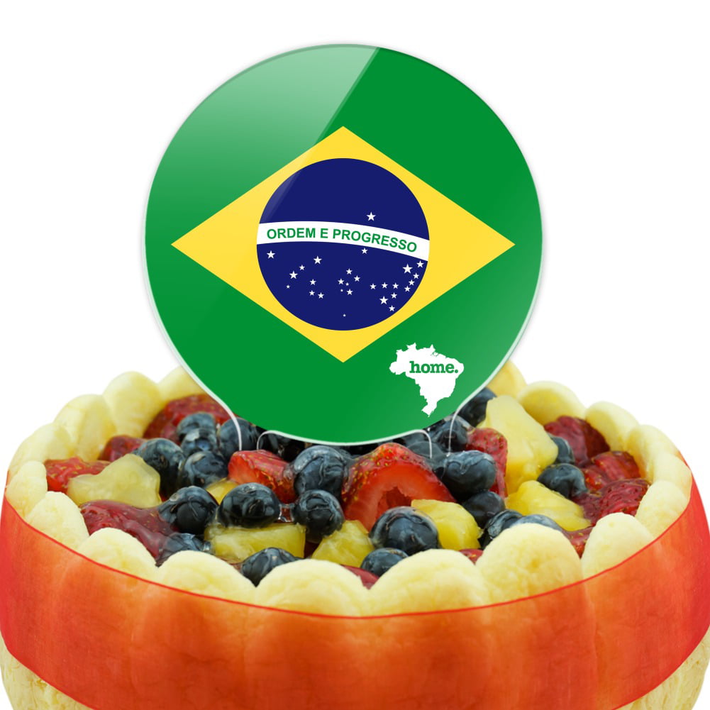 Brazilian cupcake, flag and footballs on blue background stock photo