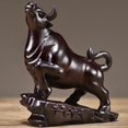 thumbnail image 4 of Ebony wood carved ox ornament, solid wood zodiac ox, symbolizing prosperity and good fortune, a craft item for home use, living room, or office decoration., 4 of 4