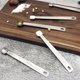 thumbnail image 4 of Juego de 5 cucharas medidoras de acero inoxidable que ahorran espacio, 4 of 9