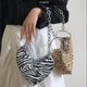 thumbnail image 2 of Bolso de mano con diseño de cebra y asa de cadena de metal irregular para mujer, sencillo, informal, todo en uno, portátil, novedad de 2024, 2 of 5