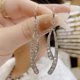 thumbnail image 3 of Pendientes de cola de pez con cruz de circón de alta calidad, ligeros, de lujo, elegantes, con cara modificada para celebridades de Internet, joyería ligera para las orejas, 3 of 6