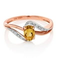 thumbnail image 2 of Gem Stone King 10K Rose Gold Yellow Citrine and Diamond Engagement Bypass Ring for Women | 0.44 Cttw | Gemstone Birthstone | Oval 6X4MM (Size 6), 2 of 4