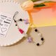thumbnail image 1 of Pulsera hecha a mano de nicho estilo milenio Y2K linda chica dulce y sexy para cadena de teléfono móvil cámara CCD cordón de cuentas, 1 of 5