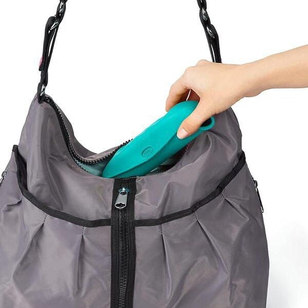 OXO Tot - Roll-Up Bib - Comfortable Soft Waterproof Lightweight Silicone Baby Bib and Toddler - Fabric Rolls Up into Pocket for Travel and Storage - Teal