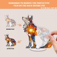 thumbnail image 3 of Rotating acrylic ornament features colorful glass fragments forming a decorative wolf glowing brilliantly in sunlight against a pure white background, 3 of 8