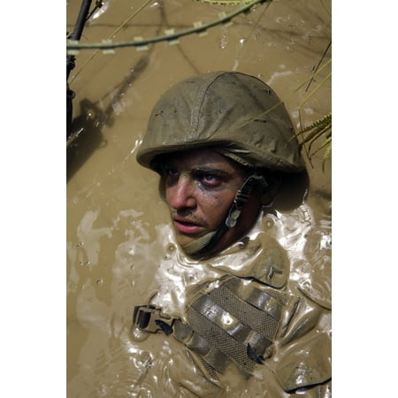 US Marine advancing through an obstacle course at the Jungle Warfare Training Center in Okinawa Japan Canvas Art - Stocktrek Images (23 x