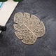 thumbnail image 5 of Mantel individual de PVC de hoja de monstera dorada, posavasos resistente al calor para café, té, vino, mantel decorativo, 4.7x3.9 pulgadas, diseño hueco, regalo del día de la madre, 5 of 5