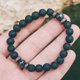 thumbnail image 2 of Pulsera de cuentas Sunnimix de piedra natural de Buda tibetano 8 mm gris, 2 of 8